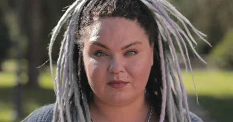 Portrait of happy smiling especially interesting woman with piercings with Stock Footage 136546110