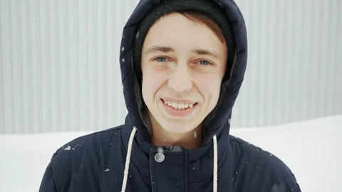 Portrait of a happy young man looking at the camera and laughing under the Stock Footage 102062002