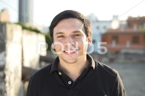 Portrait of a happy young man Stock Photos