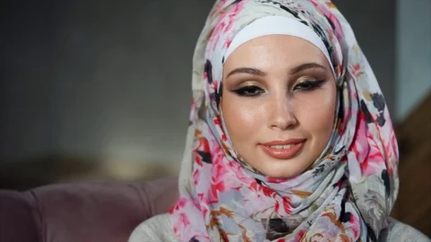 Portrait of happy young Middle Eastern woman at home Stock Footage 75914067