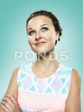 Portrait of happy young woman, studio shot Stock Photos