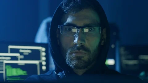 Portrait of hardworking pensive programmer working on data code in a software Stock Footage 108823291