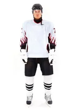 Portrait of healthy sportsman in hockey uniform in studio Stock Photos