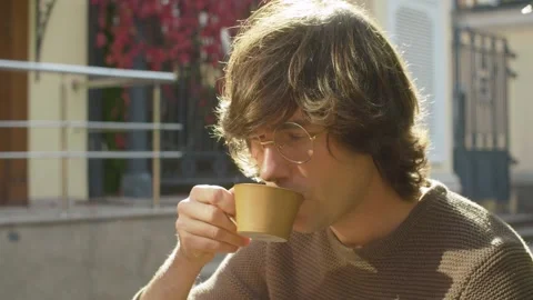 Portrait of hipster drinking coffee Stock Footage 142453711