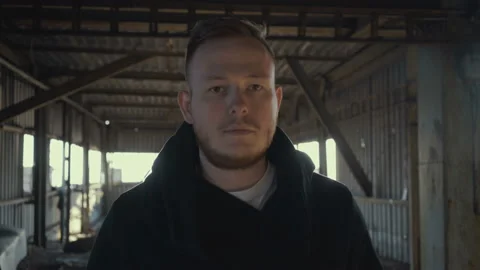 Portrait hipster man looking at camera. Stock Footage 89411529