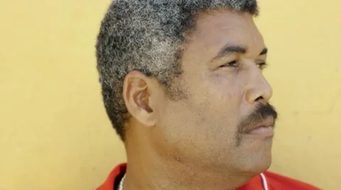 Portrait of hispanic mature man staring at camera Video stock 7765485