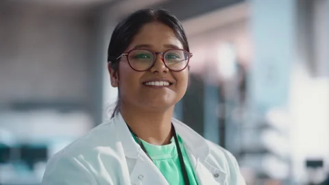 Portrait of Indian Engineer in Lab Looking at Camera Stock Footage 243256122