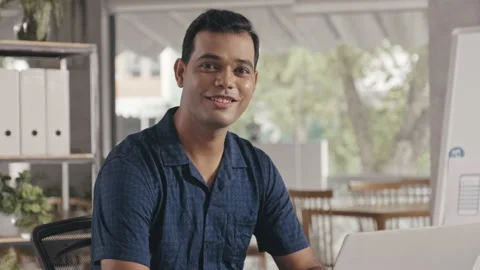 Portrait of Indian Programmer Working on Laptop in Office Stock Footage 232420645