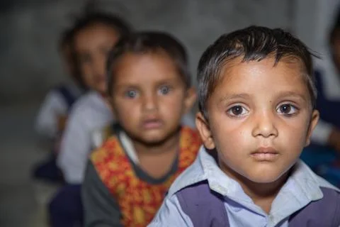 Portrait of Indian rural pre school girls in classroom at village school. Stock Photos