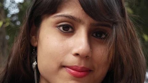 A portrait of an Indian young female making faces Stock Footage 59411975