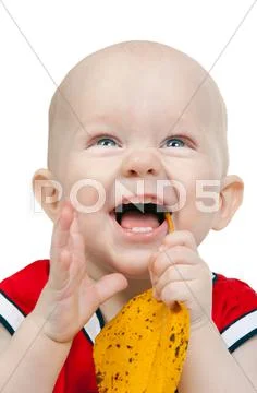 Portrait of infant boy with yellow autumn leaves Stock Photos