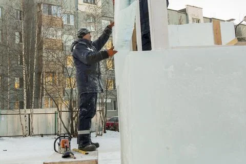 Portrait of the installer at the ice panel 写真素材