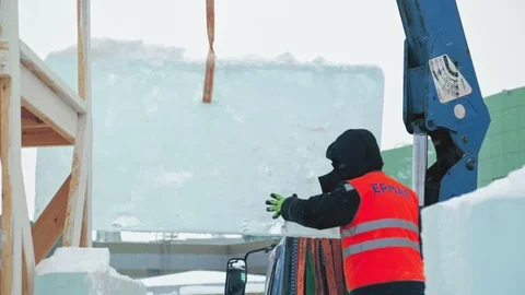Portrait of installer at unloading ice blocks Stock Footage 106077763