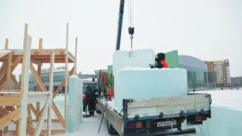 Portrait of installer at unloading ice blocks Stock Footage 106077981