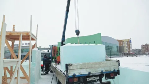Portrait of installer at unloading ice blocks Stock Footage 106078070