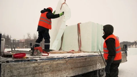 Portrait of installer at unloading ice blocks Stock Footage 106700839