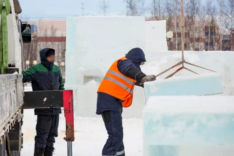 Portrait of installer at unloading ice blocks Fotos Stock