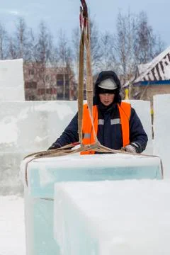 Portrait of installer at unloading ice blocks 스톡 사진