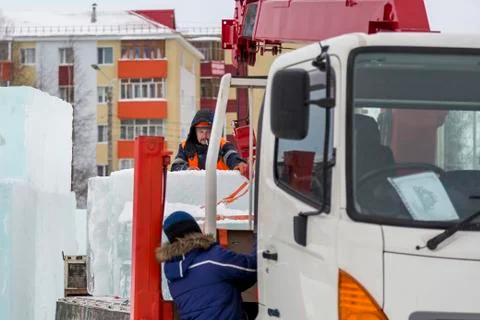 Portrait of installer at unloading ice blocks 스톡 사진