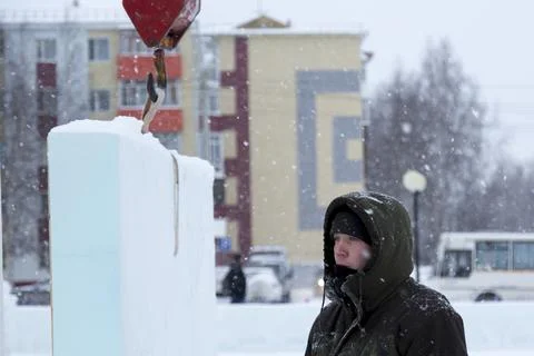 Portrait of installer at unloading ice blocks 스톡 사진