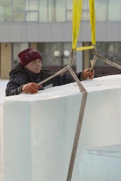 Portrait of installer at unloading ice blocks 写真素材
