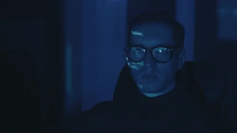 Portrait of IT hacker programmer developer in eyeglasses working computer, cyber Stock Footage 147590987