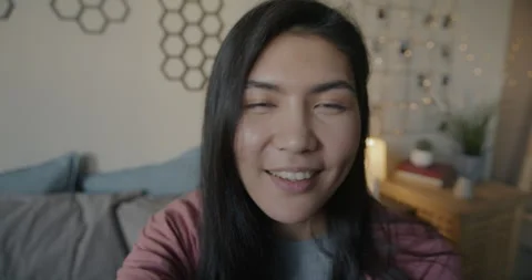 Portrait of joyful Asian student making online video call speaking looking at Stock-Footage 280673979