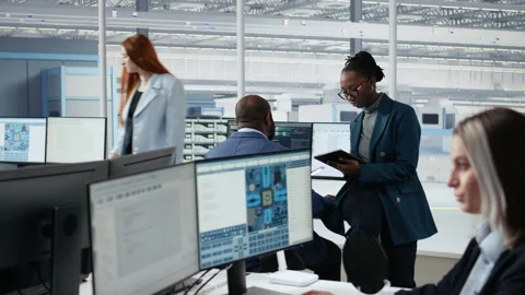 Portrait of joyous female engineer in microchip factory RD office Stock Footage 335877739