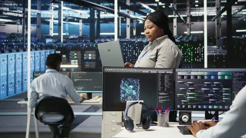 Portrait of joyous server hub technician using AI visualization insights Stock Footage 307016836