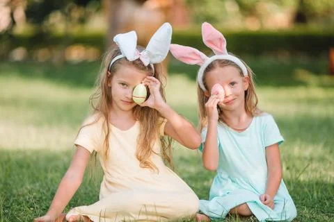 Portrait of kid with easter busket with eggs outdoor Stock Photos