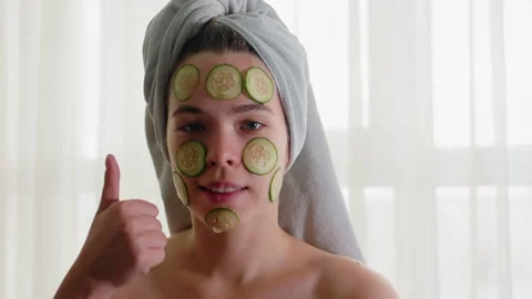 Portrait of Lady with Cucumber Slices on Face and Hair Wrapped in Towel Lifting Stock Footage 308593853