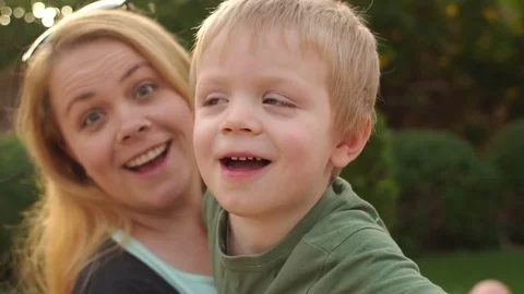 Portrait of laughing mother and baby in ... | Stock Video | Pond5