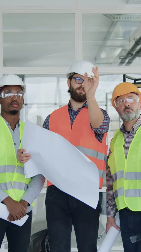 Portrait of likable considerate high-skilled modern team of specialists of build Video stock 327925547