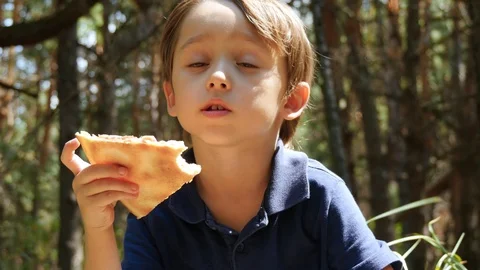 Portrait of a little boy. The child bite... | Stock Video | Pond5