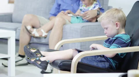 Portrait of little boy using tablet Видео 67297473