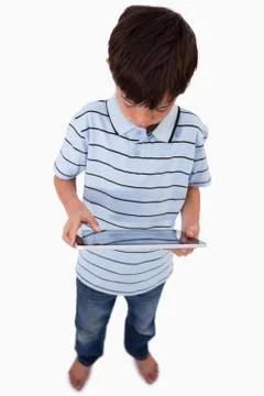 Portrait of a little boy using a tablet computer Stockfoto's