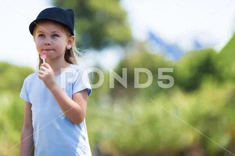 Portrait of a little charismatic girl. little girl in a headdress. girl with Stock Photos