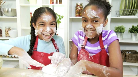 Portrait Little Ethnic Girls Faces Covered Baking Flour Stock Footage