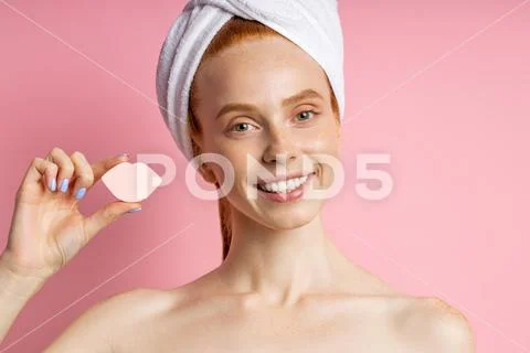 Portrait of lovely lady with naked shoulders isolated on pink background Stock Photos