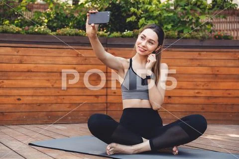 Portrait of a lovely young fitness girl Stock Photos