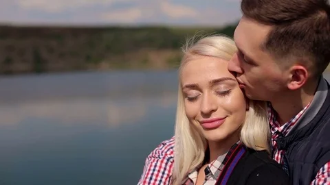 Portrait of loving couple embracing in nature. Stock Footage