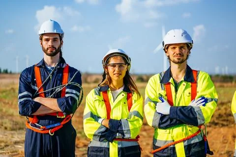 Portrait of maintenance engineers technicians working outdoor together Stock Photos