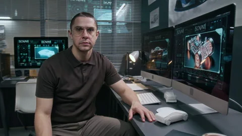 Portrait of Male Car Engineer Working on Digital Renders on Computer Stock Footage 304421863