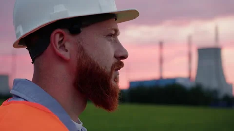 Portrait of a male engineer on the background of a power plant Stock Footage 201482825
