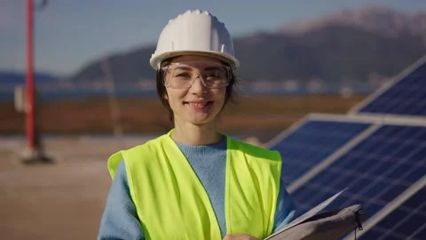 Portrait of Male Project Supervisor Talking with a Female Industrial Solar Stock Footage 289020629