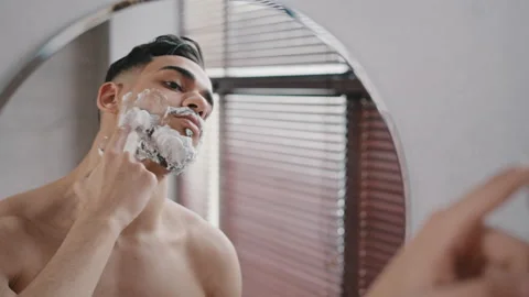 Portrait male reflection in mirror naked... | Stock Video | Pond5