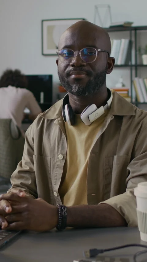 Portrait of Male Senior Programmer Sitting at Office Table during Workday Stock Footage 299211006