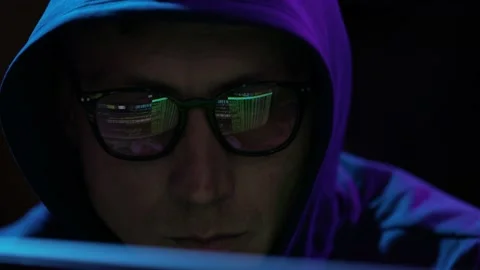 Portrait of male software developer wearing eyeglasses, working on computer Stock Footage 234150096