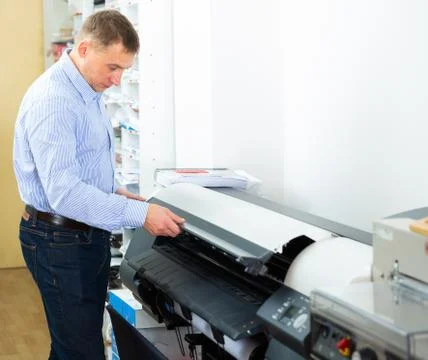 Portrait of male worker at plotter Stock Photos