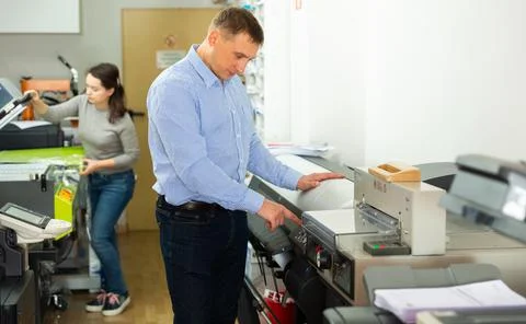 Portrait of male worker at plotter Stock Photos